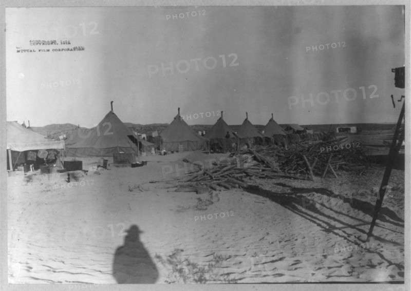 U.S. Army tent camp in Mexico, 1914- row of tents; movie camera at far right