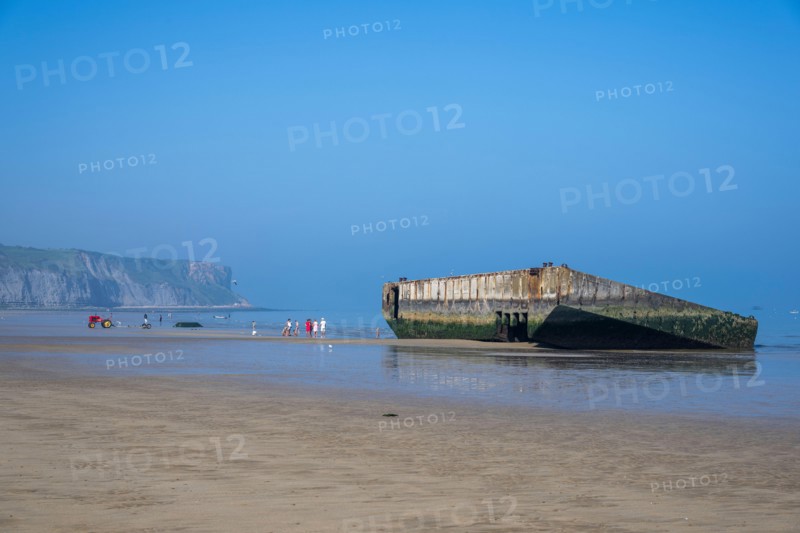 Remains of a Mulberry Harbour on the beach at Arromanches-les-Bains, Normandy, France.