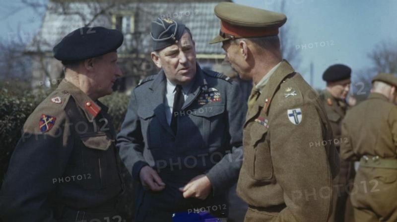 Preparations For 'operation Varsity', the Crossing of the Rhine, at Walbeck, Germany, 22 March 1945 The Commander of the 21st Army Group, Field Marshal Sir Bernard Montgomery (left), the Commander of the 2nd Tactical Air Force, Air Marshal Sir Arthur Coningham (centre) and the Commander of the British 2nd Army, Lieutenant General Sir Miles Dempsey, talking after a conference held in a small German village attended by all Senior Officers of the 21st Army Group and 2nd Tactical Air Force. At the conference Field Marshal Montgomery gave the order for the 2nd Army to begin the assault crossing of