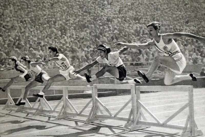Photograph of Mildred Ella "Babe" Didrikson Zaharias (1911 - 1956)  winning the 80m Hurdles at the 1932 Olympic games. Babe gained world fame in track and field and All-American status in basketball.