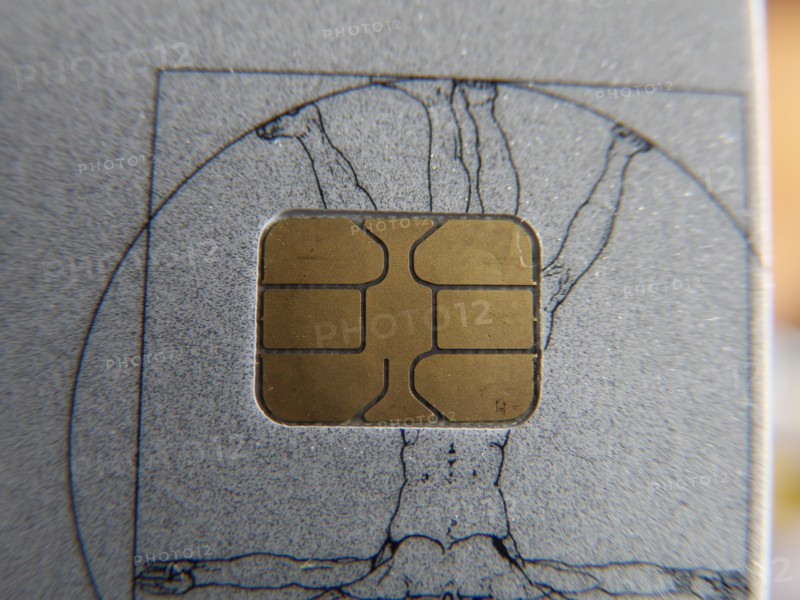 Closeup view (macro) of chip on a health insurance card used for saving data and as patient identification card