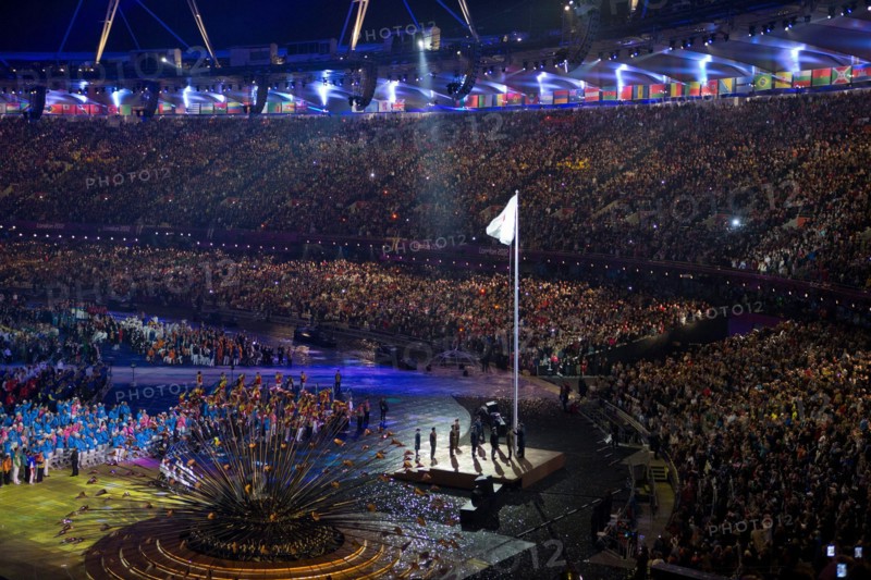 London England, August 29 2012: A sellout crowd at Olympic Stadium watches the spectacle of the Opening Ceremonies of the 2012 London Paralympic Games.  ©Bob Daemmrich
