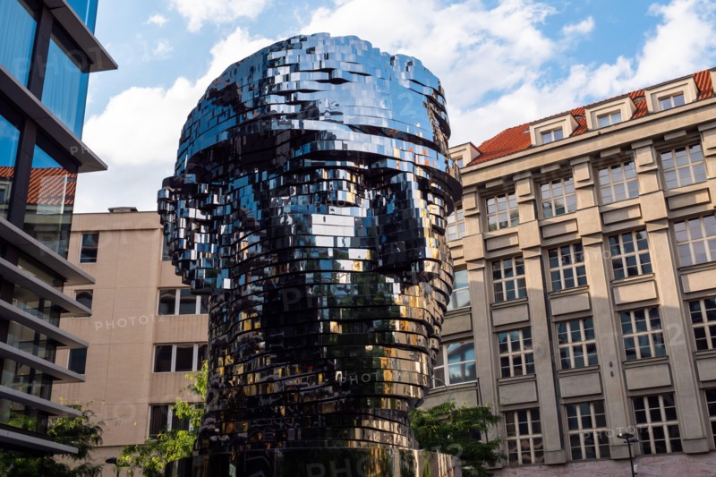 Prague, Czech Republc - July 11 2020: Turning Head of Franz Kafka in Czech Hlava Franze Kafky Statue by Davd Cerny