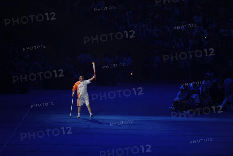 Beijing, China  September 6, 2008: Handicapped Paralympic torch-bearer at the Opening Ceremonies of the Beijing Paralympics at China's National Stadium, known as the Bird's Nest.      ©Bob Daemmrich