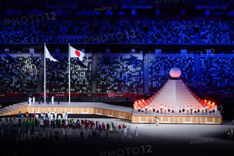 Tokyo, Japan, 23 July, 2021. The Olympic flag is raised during the Opening Ceremony of the Tokyo 2020 Olympic Games . Credit: Pete Dovgan/Speed Media/Alamy Live News