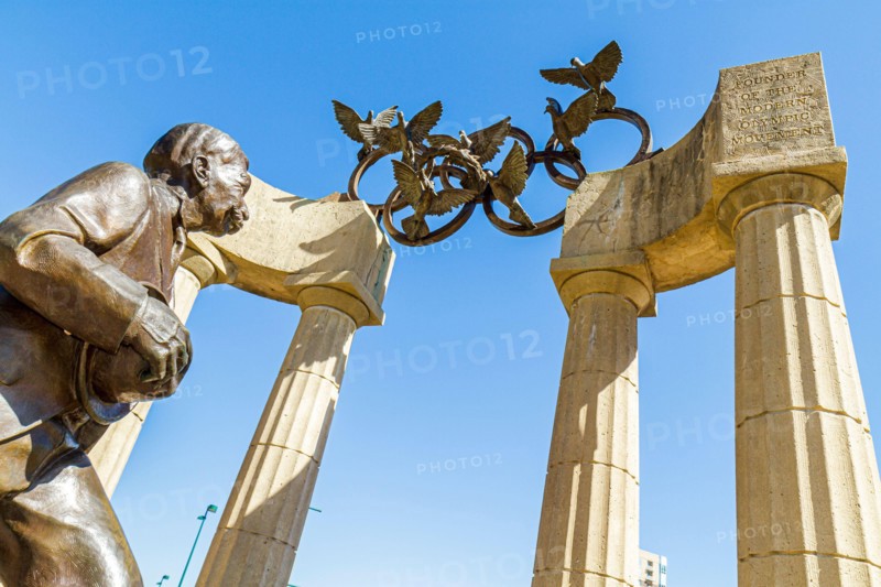 Atlanta Georgia,Centennial Olympic Park,statue Baron Pierre de Coubertin Olympic Rings columns monument memorial