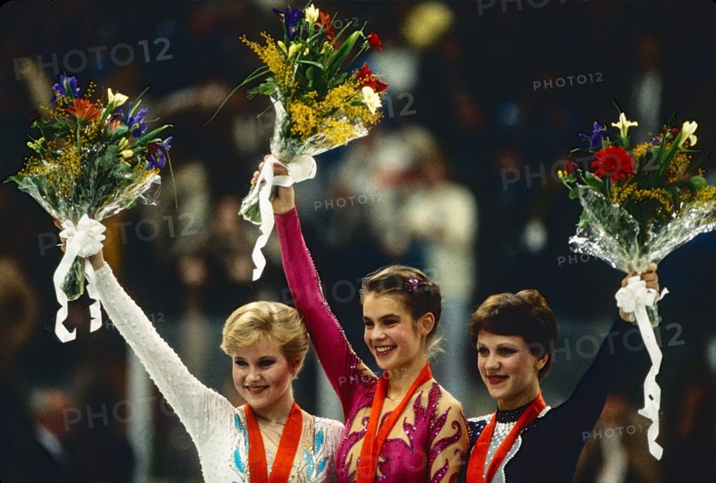 L-R Rosalynn Sumners (USA),Katarina Witt (GDR), Kira Ivanova (URS) Figure Skating Ladies' singles medalist at the 1984 Olympic Winter Games.