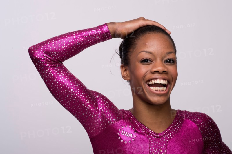 USA gymnast Gabby Douglas poses at the USOC Media Summit in Dallas, TX prior to the 2012 London Olympics