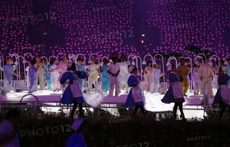 Artists perform during the Opening Ceremony of the London 2012 Olympic Games, London, Britain, 27 July 2012. The 2012 Summer Olympic Games will be held in London from 27 July to 12 August 2012. Photo: Christian Charisius dpa