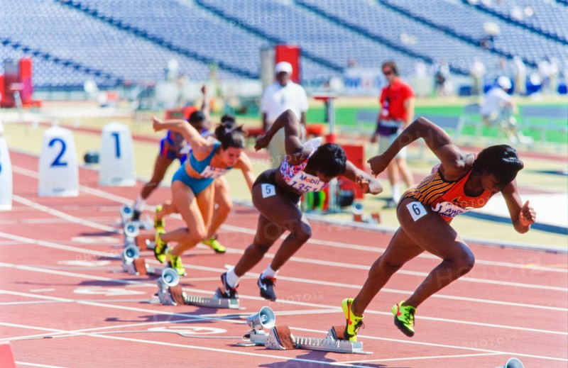 Start of Olympic race, women runners, in stadium. Atlanta 1996.