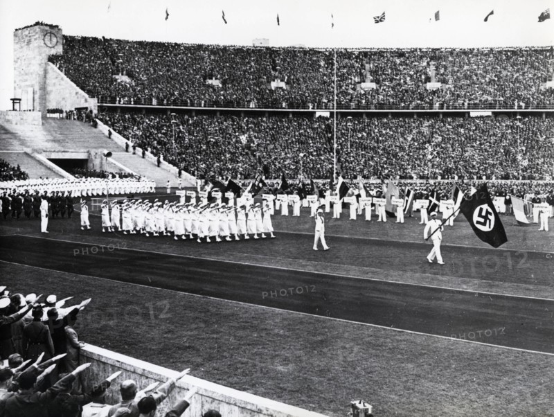 Aug. 1, 1936 - Berlin, Germany - On the opening day of the 1936 Berlin Olympic Games, the German team walks past the reviewing stand. (Credit Image: © KEYSTONE Pictures USA/ZUMAPRESS.com)