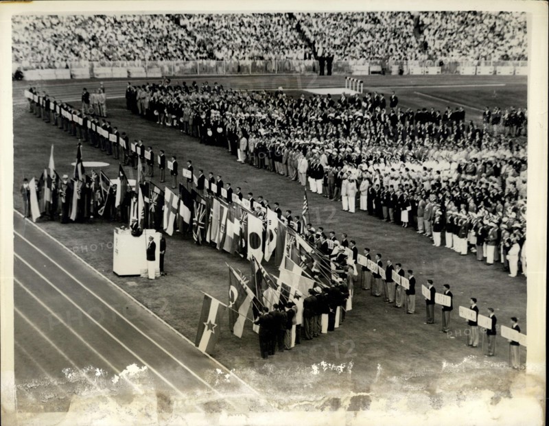Nov. 26, 1956 - Opening Of The Melbourne Olympic Games. John Landy Takes The Oath. Photo shows General view as flagbearers dip their flags as John Landy of Australia - takes the oath - at the opening of th 1956 Olympic Games, in Melbourne.