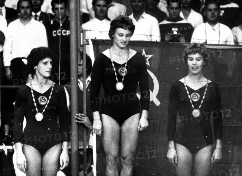 Russian gymnasts on podium at the 1960 Olympic Games