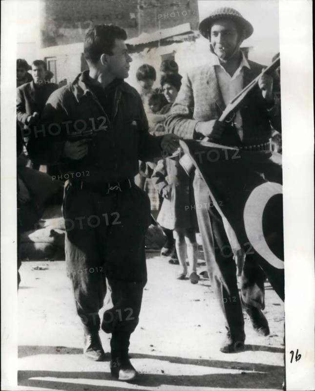 Jul. 07, 1974 - Eoka Killer Nicos Sampson Claims: I Am The New President:- Following the Greek-led coup in Cyprus yesterday Nicos Sampson, M.P. and supporter of Union with Greece. announced that he had taken over as president. A former Eoka gunman, he was sentenced to death ~under British rule, for carrying arms, but was reprieved. Later he admitted that he had helped to kill four Britons. Photo Shows: A picture from stock showing Nicos Sampson with pistol in hand, returning to Omorfita after his platoon had carried out raids on Turkish gunposts.