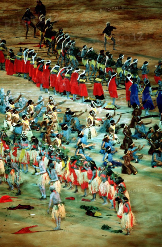 Aboriginal dancers make their way across the floor of the Olympic Stadium while performing before an audience of 110,000 (Not shown) September 15th, 2000, during the opening ceremonies for the Sydney 2000 Olympic games.