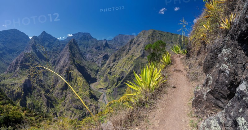Hiking trail along the crater Cirque de Mafate near Cape Noir (La Reunion)