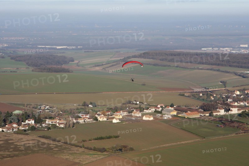 Aerial view of a paramotor flying over the commune of Soindres in the Yvelines department (78200), Ile-de-France region, France - January 03, 2010