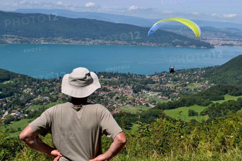 paragliding over annecy,'s lake, haute savoie, france