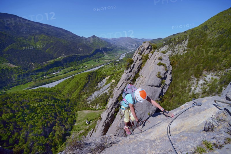 climber on via ferrata Demoiselles du Castagnet, France, Alpes Maritimes, Puget Theniers