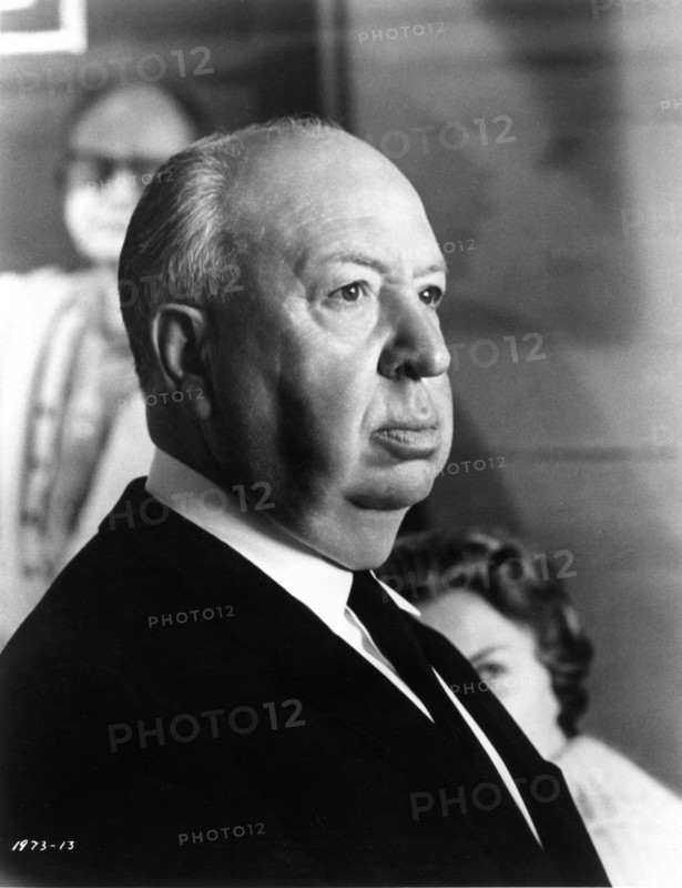 ALFRED HITCHCOCK on set candid portrait during filming of TORN CURTAIN 1966 director ALFRED HITCHCOCK writer Brian Moore music John Addison Alfred J. Hitchcock Productions / Universal Pictures