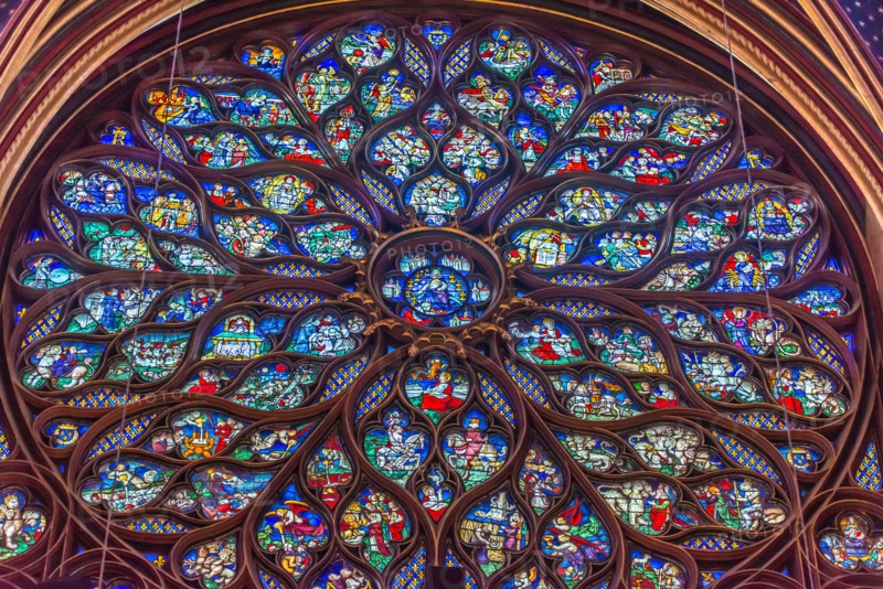 Paris, France - Dec. 27 2022: The stunning stained glass window and the beautiful ceiling in Saint-Chapelle in Paris
