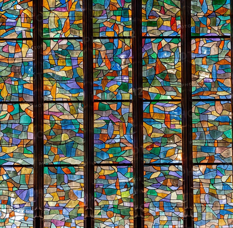 ABBEVILLE, SOMME, FRANCE, JUNE 20, 2023 :  details of stained glasses windows in Saint Sepulcre church, by Alfred Manessier workshop, year 1989  to 19
