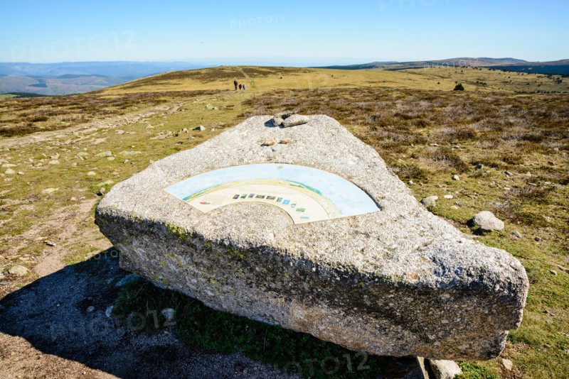 View indicator on granite boulder at the summit Pic de Finiels on Mont Lozère in the Cévennes, Lozère, France