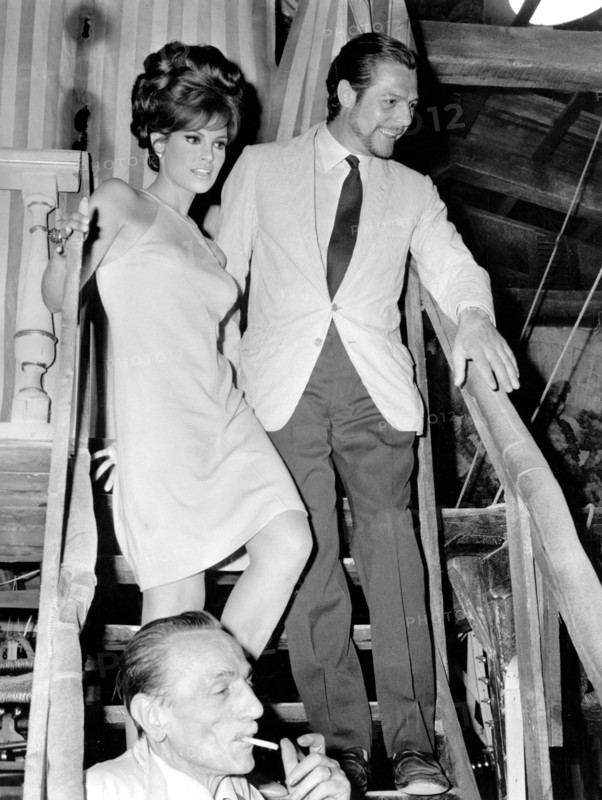 Raquel Welch and Marcello Mastroianni arriving at a club