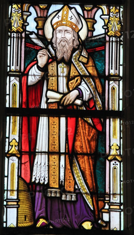 STABROEK, BELGIUM - JUNE 27, 2015: Stained glass window depicting Saint Ambrose or Ambrosius, in the Church of Stabroek, Belgium