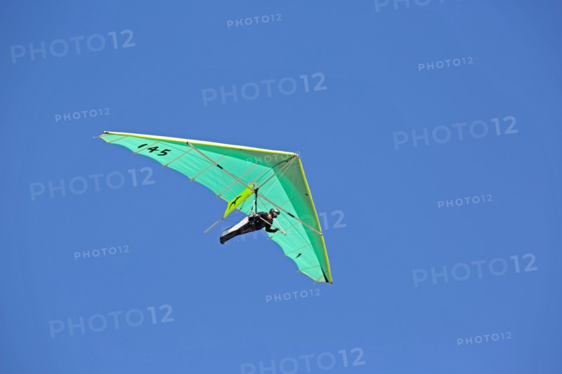 Hang glider flying over Dune of Pyla Southern France
