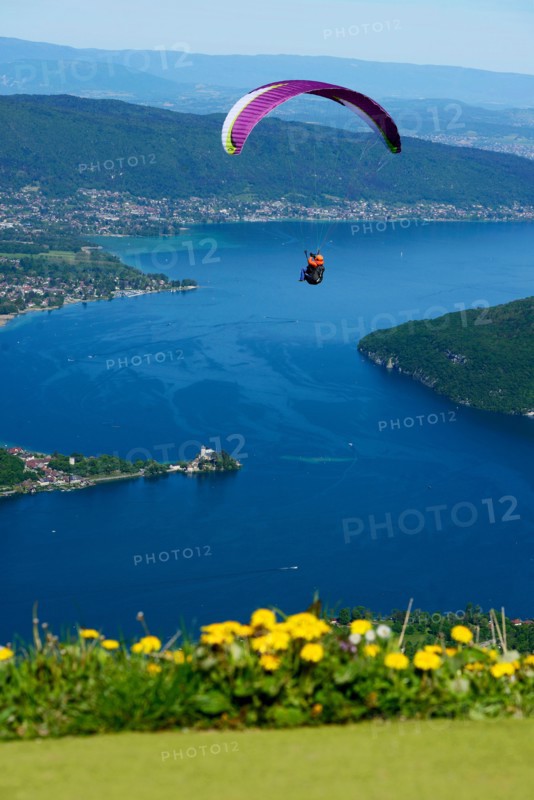 paragliding over the lake Annecy, France, Haute-Savoie