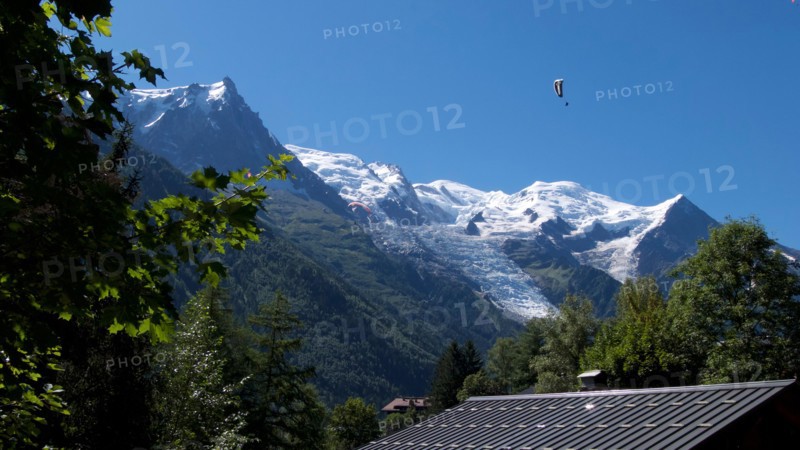 Paraglider paragliding in French Alps, Chamonix, Mont Blanc, France