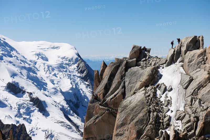 Mountaineers on summit, Chamonix, Haute Savoie, France