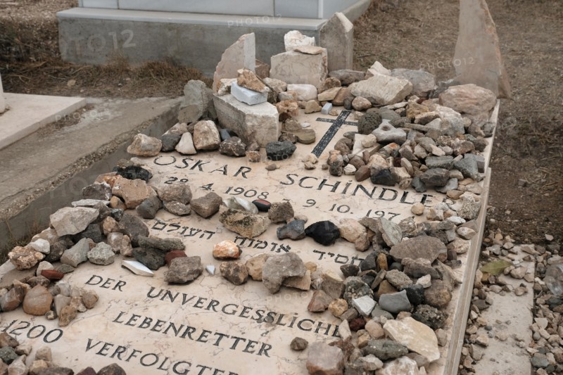 Inscription on Oskar Schindler grave in Hebrew and German reads“Oskar Schindler A righteous man among the Gentiles. The unforgettable life savor of 1200 persecuted Jews” located in the Roman Catholic Franciscan cemetery on Mount Zion Jerusalem Israel