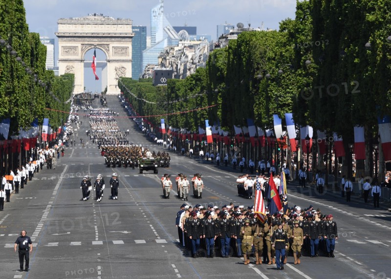170714-N-AC979-372 PARIS (July 14, 2017) Almost 200 U.S. Soldiers, Sailors, Marines and Airmen assigned to units in Europe and the 1st Infantry Division, Fort Riley, Kansas, march down the Avenue des Champs-Élysées from the Arc de Triomphe to the Place de la Concorde during the Military Parade on Bastille Day. An historic first, the U.S. led the parade as the country of honor this year in commemoration of the centennial of U.S. entry into World War and the long-standing partnership between France and the U.S. (U.S. Navy photo by Chief Mass Communication Specialist Michael McNabb/Released)