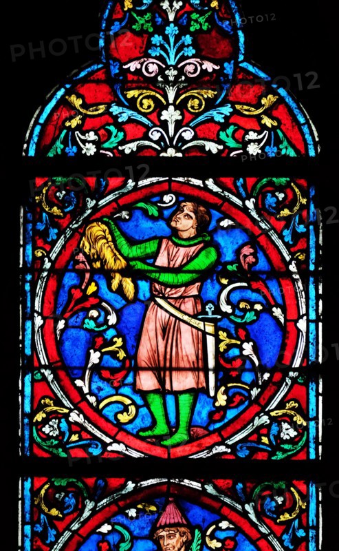 Colorful stained glass window in the Notre Dame Cathedral, UNESCO World Heritage Site in Paris, France
