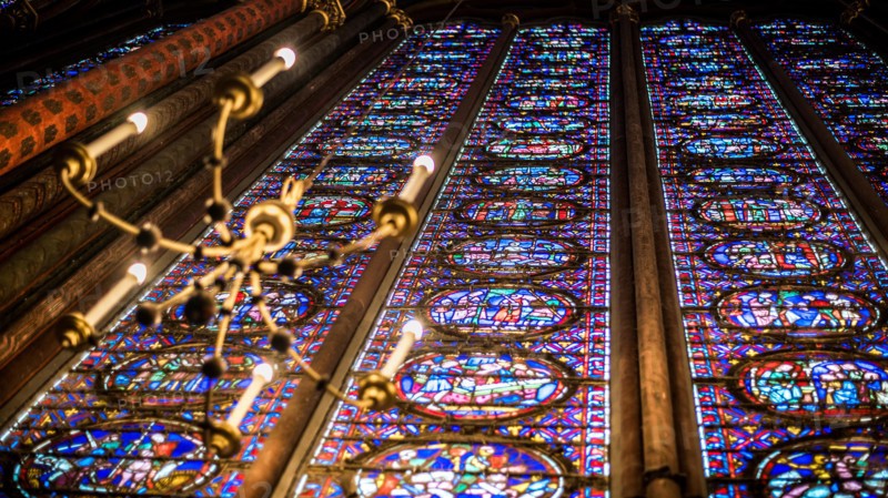 Paris, France-14 January, 2018: View interior of the famous Saint Chapelle, details of beautiful glass mosaic windows. Holy Chapel is a one of the mos