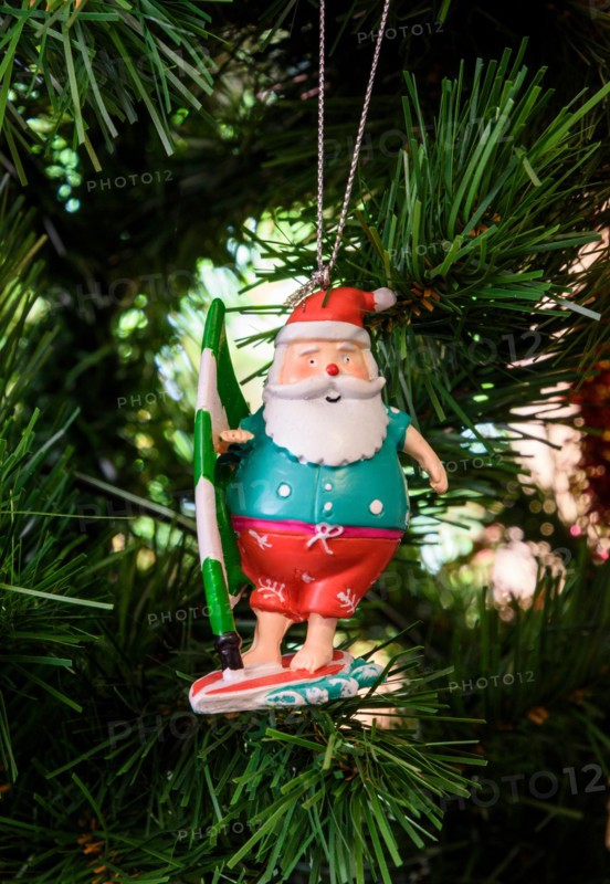 Australian Father Christmas decoration hanging on a Christmas tree in Australia