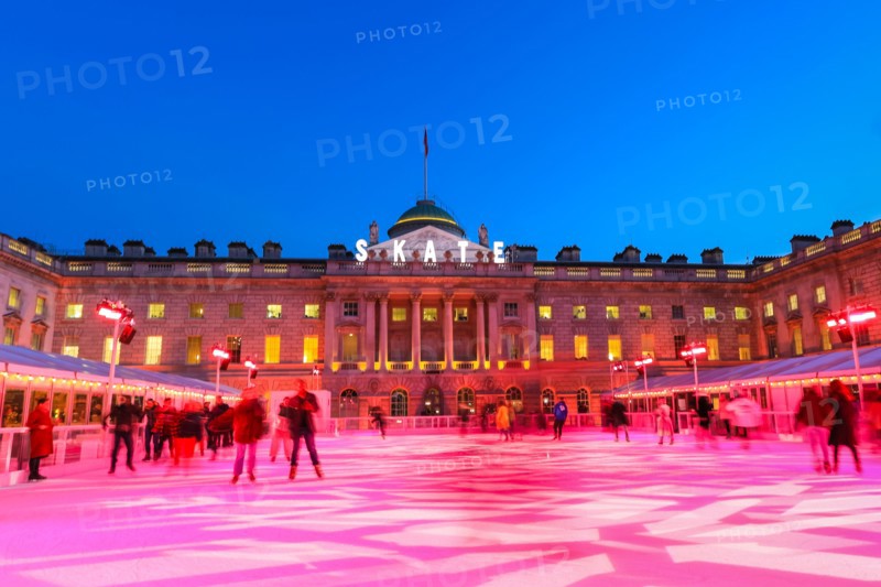 Somerset House, London, UK, 13th November 2019. Visitors enjoy skating on the pristine ice in the beautifully illuminated surroundings of Somerset House, as the annual 'SKATE' ice rink opens to the public. The outdoor area also features a bar and viewing area. Somerset House ice rink will be open 13th Nov 2019 - 12th Jan 2020 Credit: Imageplotter/Alamy Live News