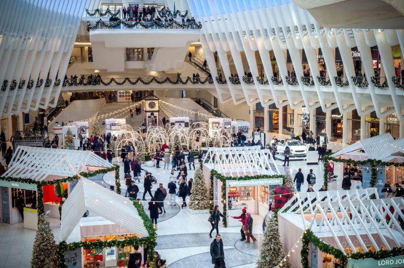 Shoppers and tourists in the Holiday Market in the Westfield Mall in the Oculus in the World Trade Center Transportation Hub in Lower Manhattan in New York on Sunday, December 8, 2019.  (© Richard B. Levine)