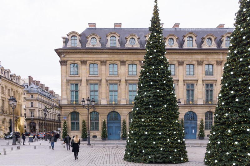 Paris Christmas - Christmas trees in a decorated Place Vendome in the 1st arrondissement of Paris, France, Europe.