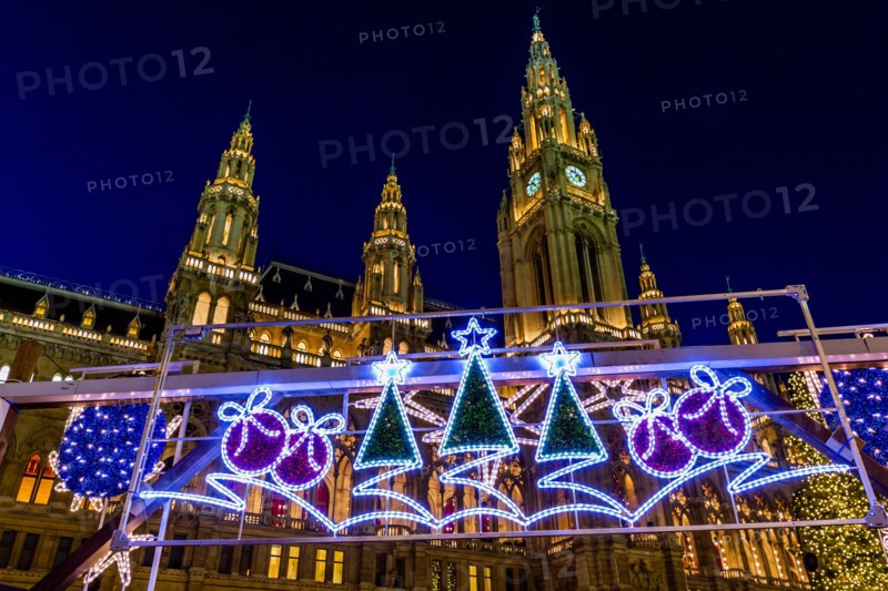 Rathaus and Christmas lights at night in Rathausplatz, Vienna, Austria, Europe