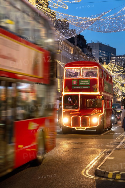 London bus covered in  Christmas lights in Regents Street Christmas 2024. Location  the West End of London