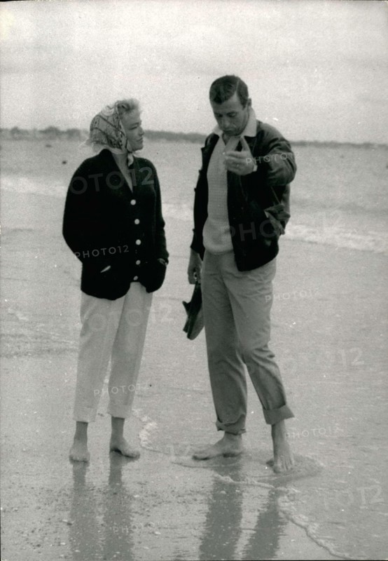 Jul. 03, 1959 - La Baule Casino just hired the famous singer Yves Montand who is experiencing a lot of success right now with his summer visitors. The record was beat the other night when his audience called him back to sing twice. However, his late night did not prevent the popular singer from getting up early in the morning for a walk outside with his wife, the charming Simone Signoret.