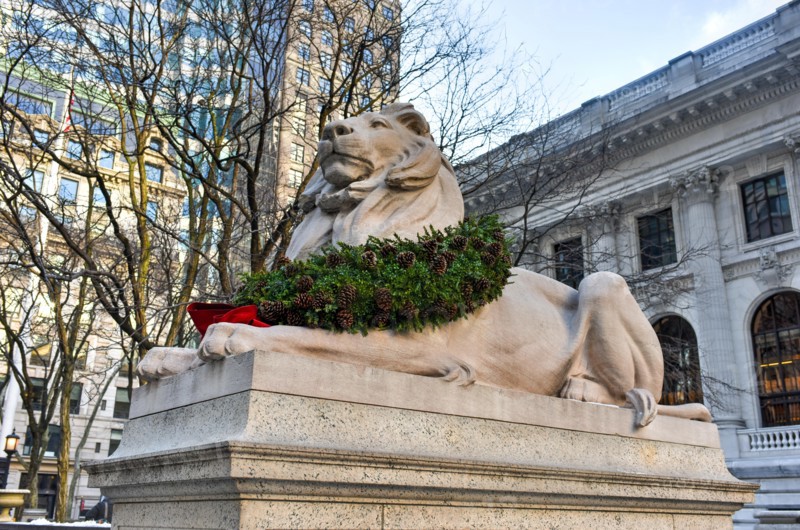 Stone lion at the entrance to the New York Public Library Main Branch in Midtown, Manhattan, New York.