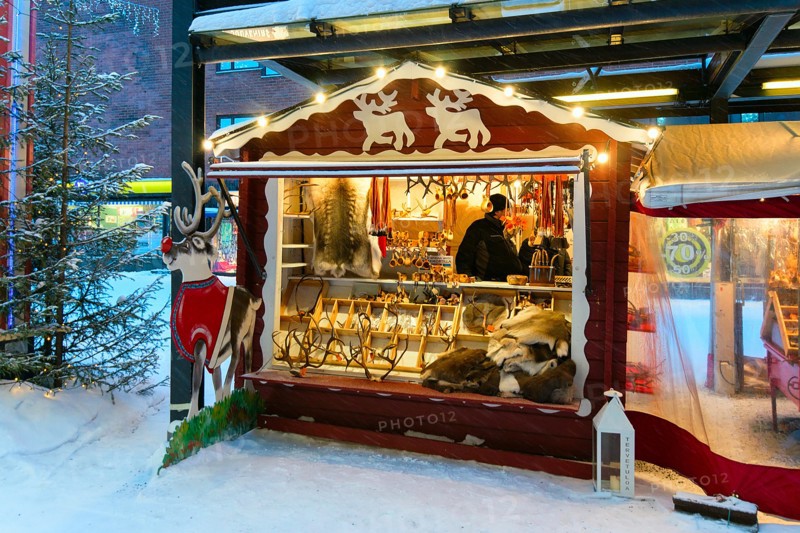 Rovaniemi, Finland - March 1, 2017: Street Market stall with traditional souvenirs in winter Rovaniemi, Lapland, in Finland.