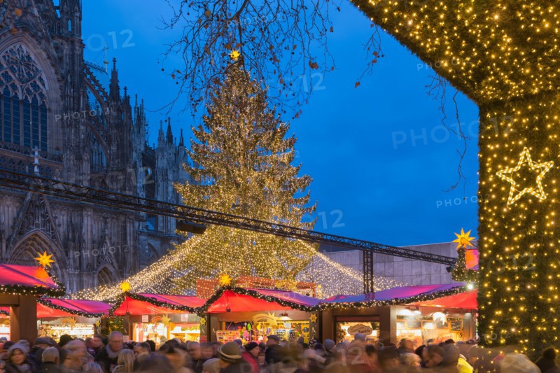 Shopping people Christmas market at square near Kolner Dom