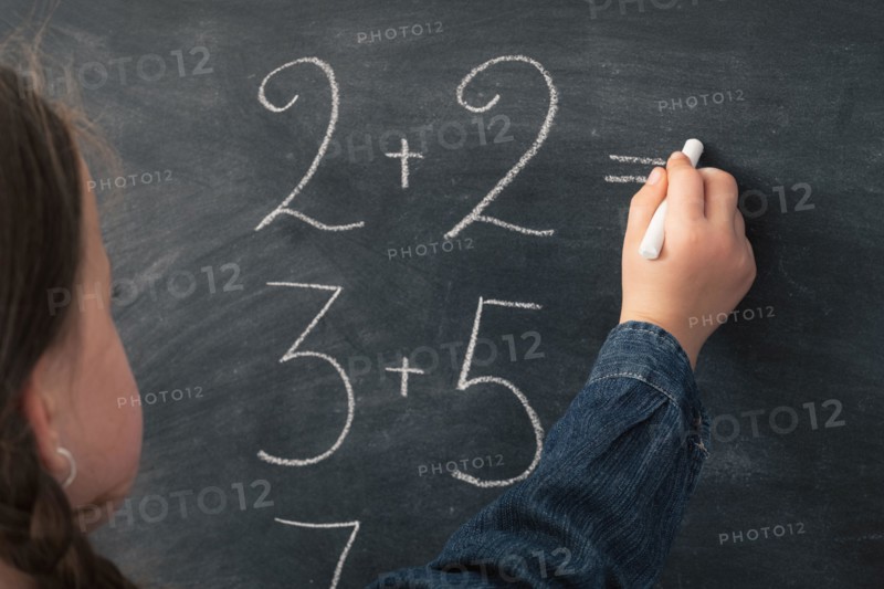 school studying mathematics girl do sum chalkboard