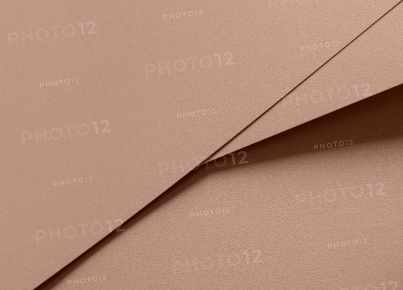 Mocha Mousse, 2025 color of year paper texture background in soft brown and beige tones.