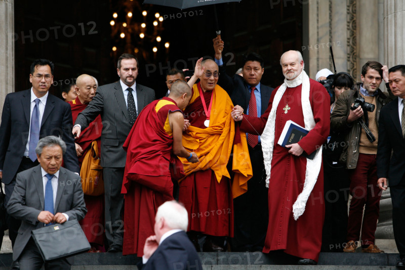 The 14th Dalai Lama (L) leaves with Richard Chartre the Bishop of London (R)  St. Paul s Cathedral, London 14 May 2012